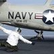Illustration for article titled Here Is What All Those Colored Shirts Mean On An Aircraft Carrier's Deck